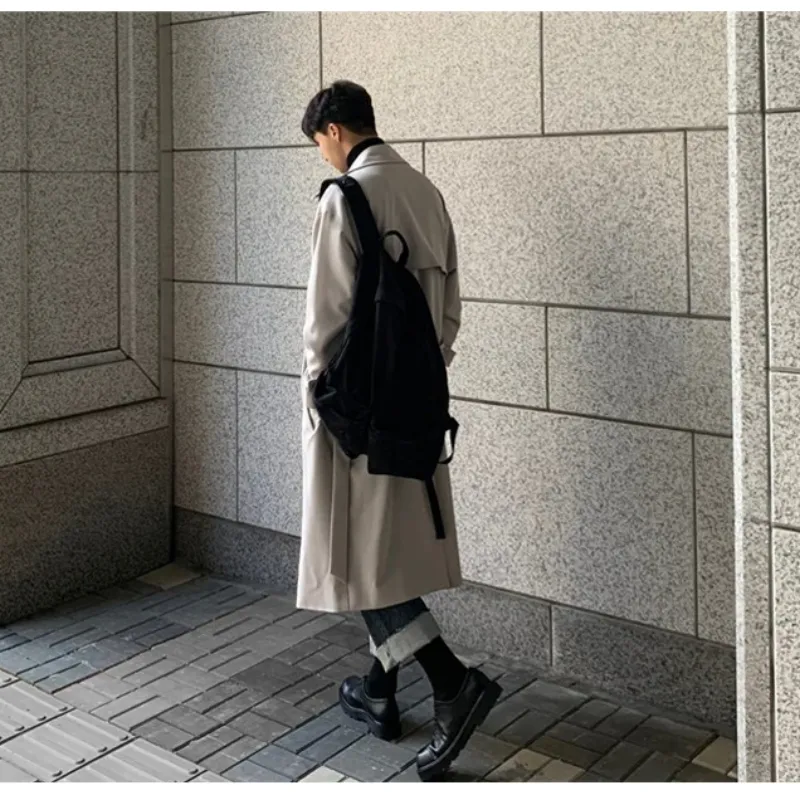 Modern men's coat - Long trench coat with a loose fit